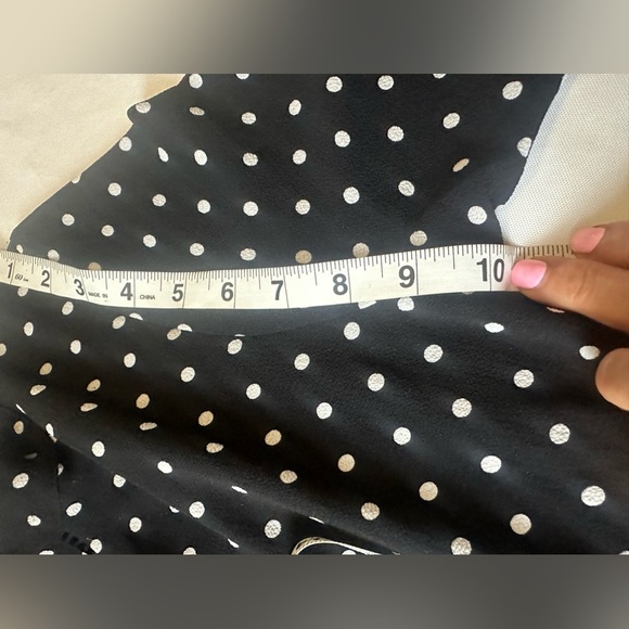 Brand: NAIF, black dress, with white dots, and flared sleeves - Picture 6 of 12